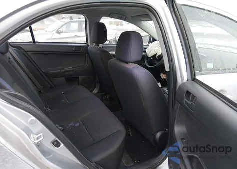 2014 Mitsubishi Lancer Es from USA, damaged, VIN JA32U2FUXEU009760